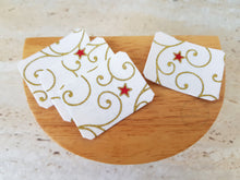 Load image into Gallery viewer, Set of 4 Cream and Gold Swirl Placemats