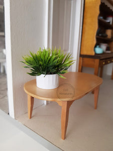 Faux Plant in White Plastic Pot