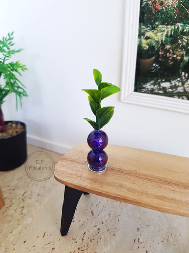 Small Plant in a Purple Beaded Pot