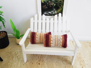 Pair of Burgundy Pom-Pom Trimmed Cushions