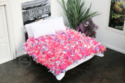 Pink and Lilac Tufted Knitted Blanket