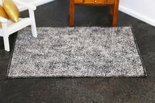 Load image into Gallery viewer, Black and Cream Patterned Rug